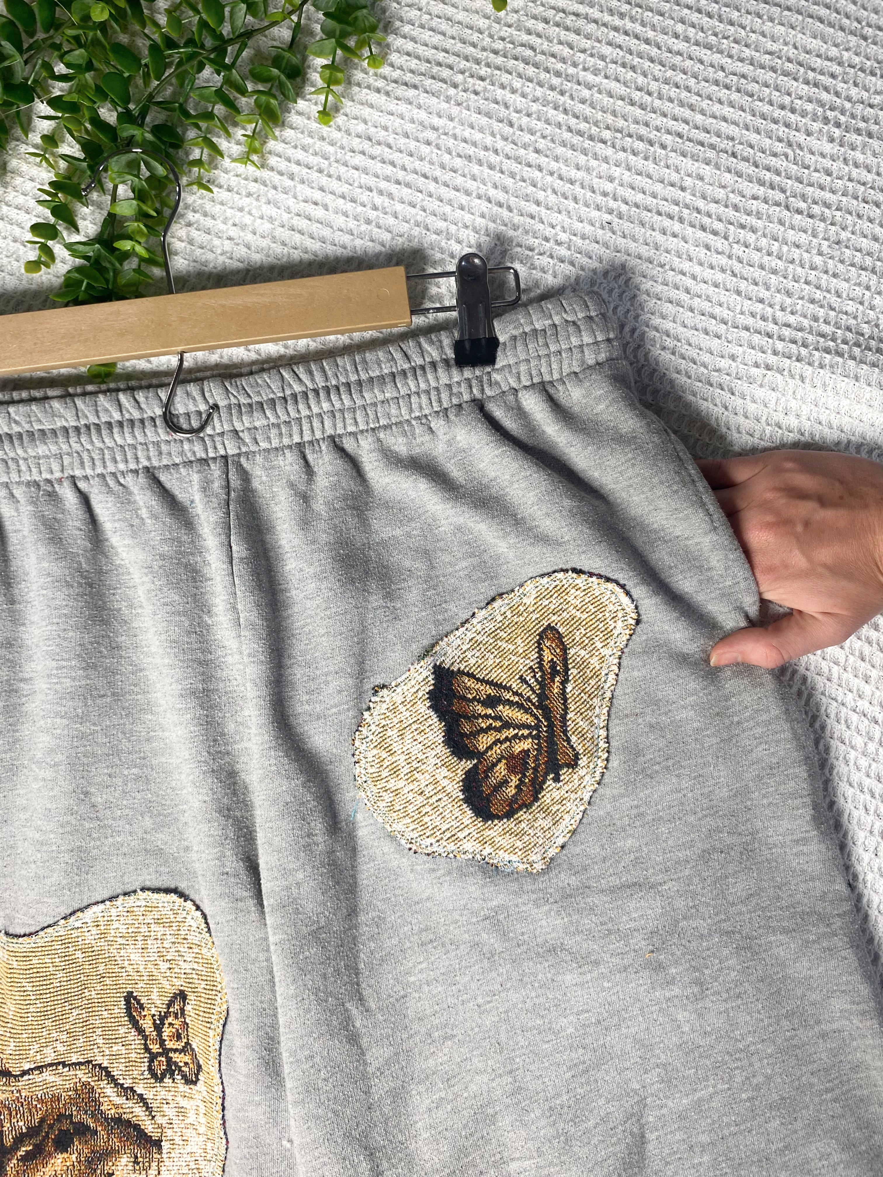 Tapestry spring-inspired fringe sweatpants
